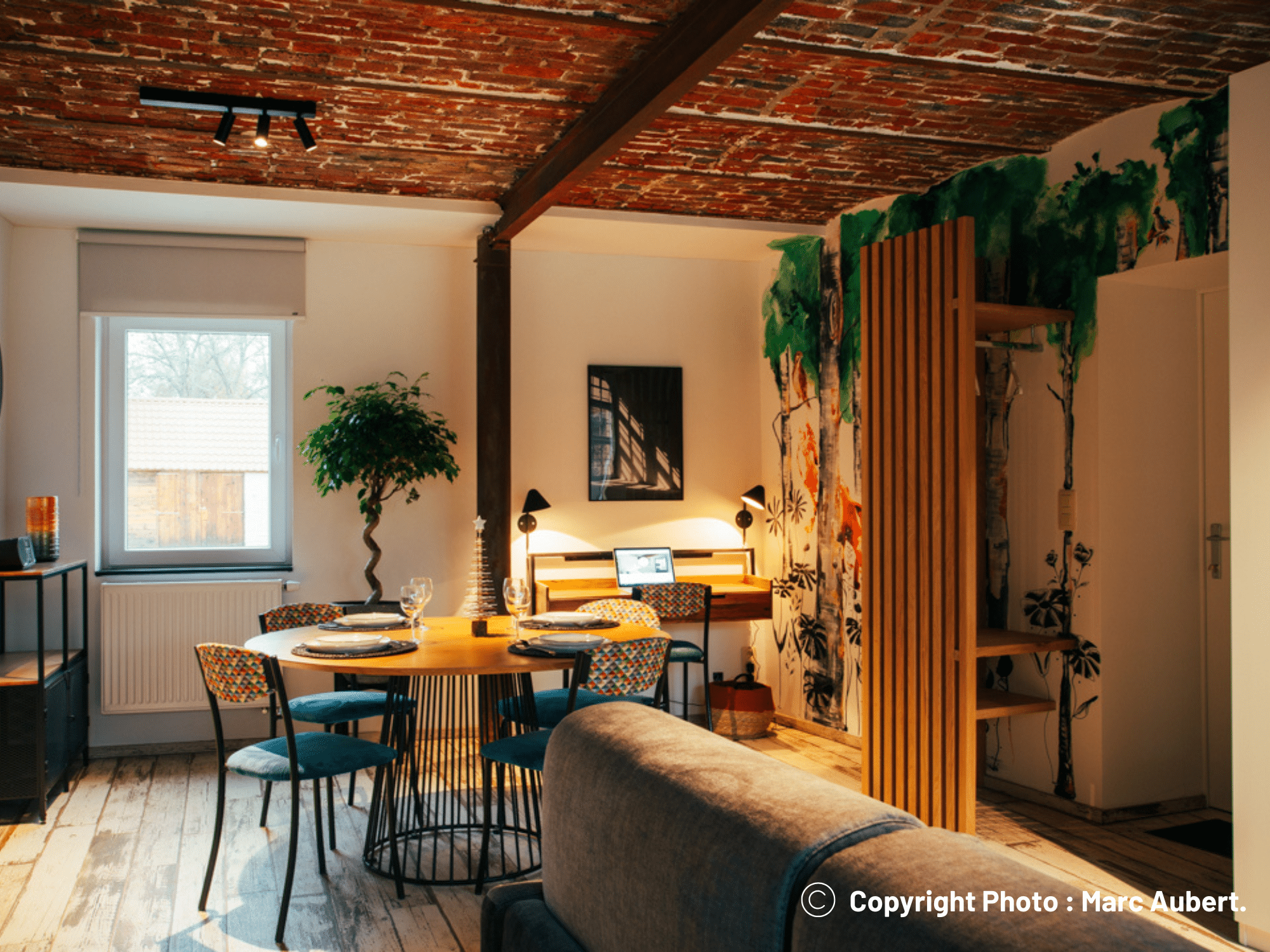 Image illustrant l'intérieur du gîte le Relais de la Posterie avec un intérieur soigné